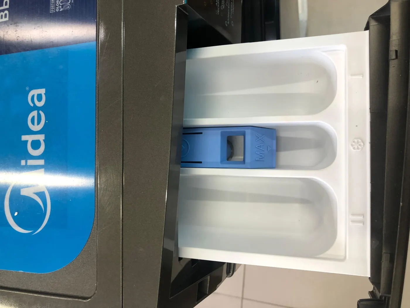 Стиральная машина Midea MF200D80WBS/S-RU серый, Уценка — фото дефекта 2